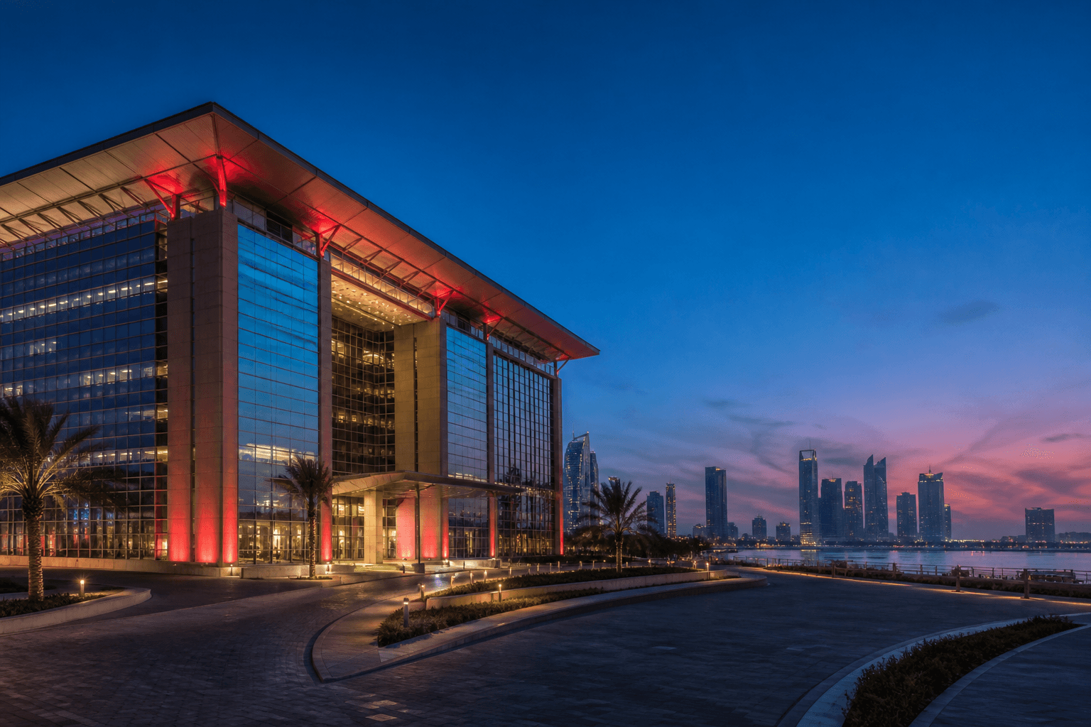 Manama waterfront office building at dusk for Bahrain commercial registration